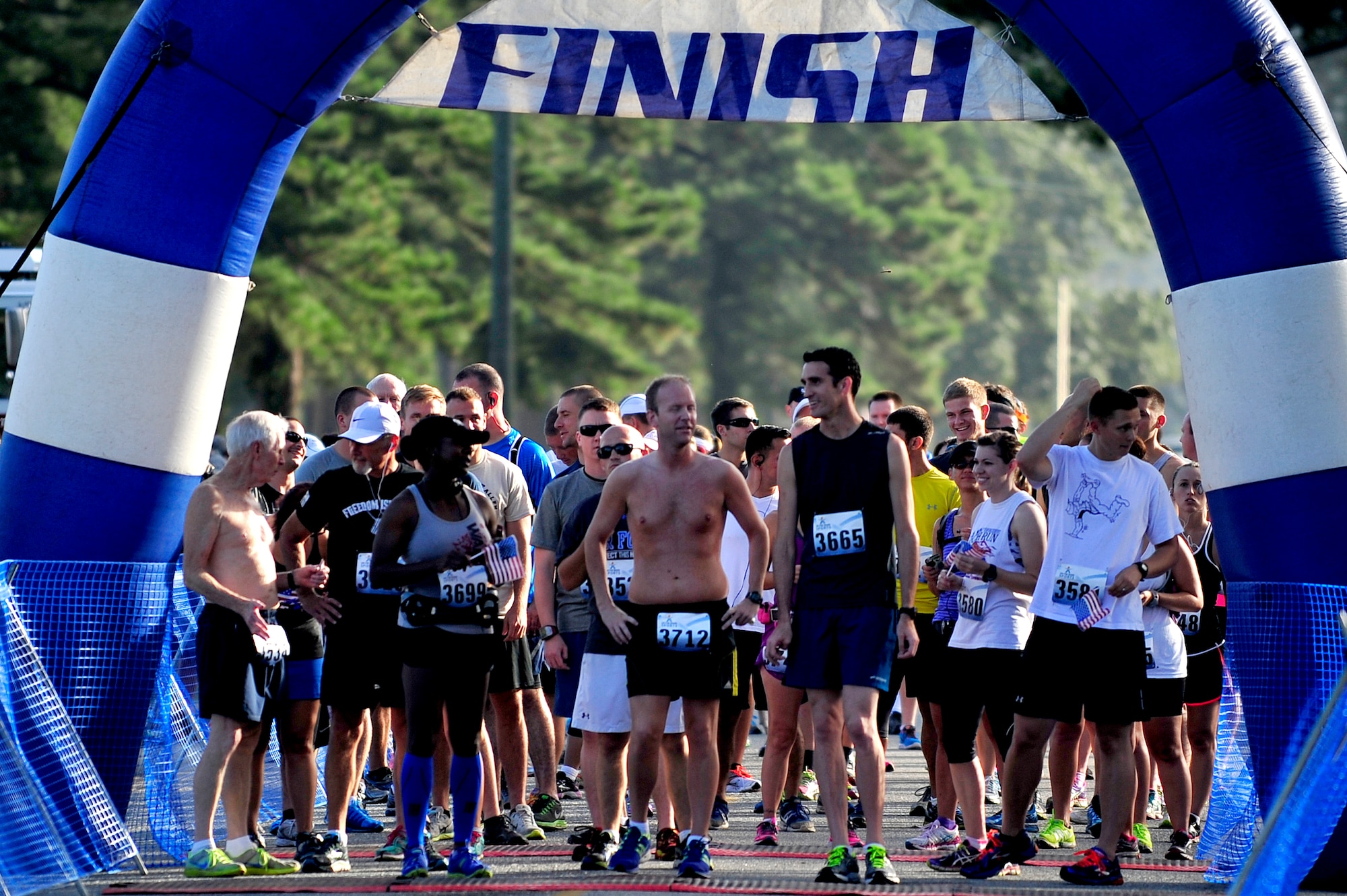 Participants line up for the half-marathon during the Run for the Fallen on Sept. 6 at Seymour Johnson Air Force Base, N.C. The Seymour Johnson AFB Company Grade Officer’s Council hosted the event. More than 275 military service members and their families assigned to installations across the East Coast participated in the run. [Note: The Seymour Johnson Air Force Base Company Grade Officer's Council is a private organization. It’s not a part of the Department of Defense or any of its components and it has no governmental status] (U.S. Air Force photo/Airman 1st Class Shawna L. Keyes)