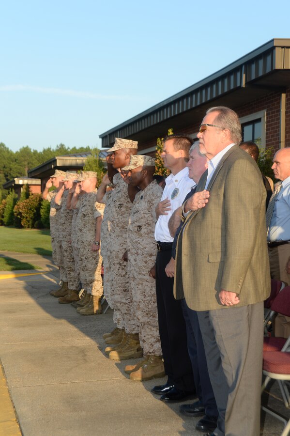 Marine Corps Logistics Base Albany and its tenant commands' officials as well as Marines, policemen, firemen, civil servants, veterans and families observed the 13th anniversary of 9/11 in front of the installation's Coffman Hall. The commemoration included an invocation, Taps, a moment of silence, a speech by MCLB Albany's commanding officer, Col. Don Davis, and a closing prayer. Davis emphasized to those at the observance to "remember the fallen of that day, remember who has fallen since, and remember that what you do here on a day-to-day basis contributes to whether or not their deaths were in vain."  