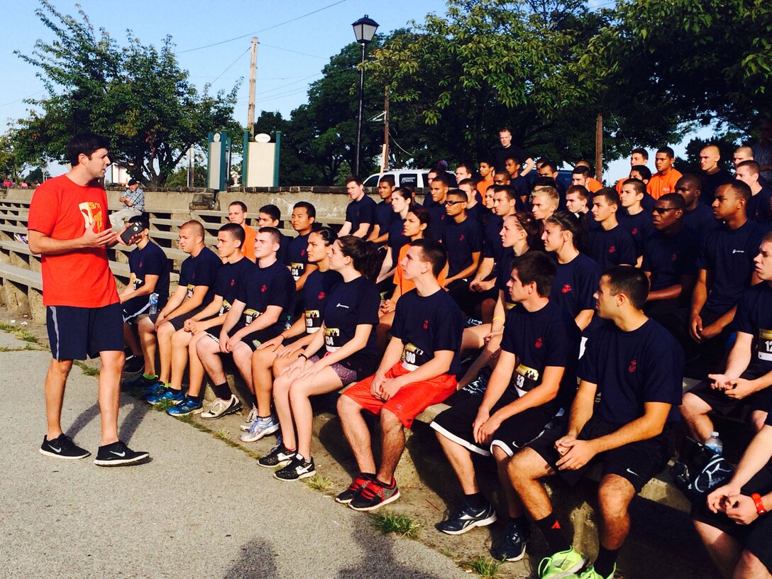 PENNSAUKEN, N.J. – Paul Fischer, former Marine Captain and friend of Travis Manion, speaks to more than 60 Marine Corps poolees before the 9/11 Heroes 5K run in Pennsauken, N.J., Sept. 7, 2014. The run was created by the Travis Manion Foundation to commemorate fallen military service members, police officers, firefighters, and emergency responders. 1st Lt. Travis Manion was killed in action while serving in Al-Anbar Province in Iraq in 2007.