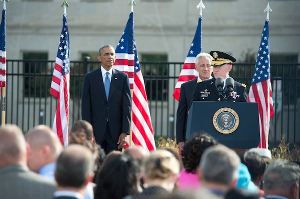 Chairman of the Joint Chiefs of Staff Gen. Martin E. Dempsey gives remarks at a ceremony at the Pentagon Memorial in honor of the 13th anniversary of the attack on the Pentagon, Sept. 11, 2014.