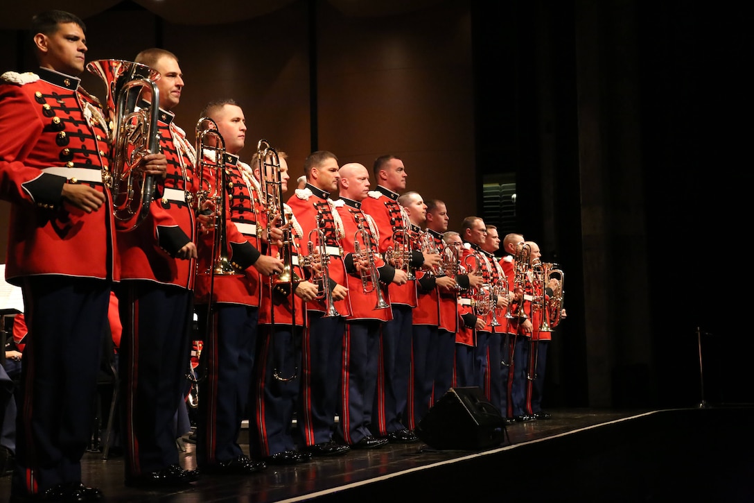 The President's Own Marine Band brass section takes center stage during the band's performance at Butler University in Indianapolis Sep. 7. The Band performed for more than 1,500 people at Clowes Memorial Hall during their 30-day fall concert tour across the United States.