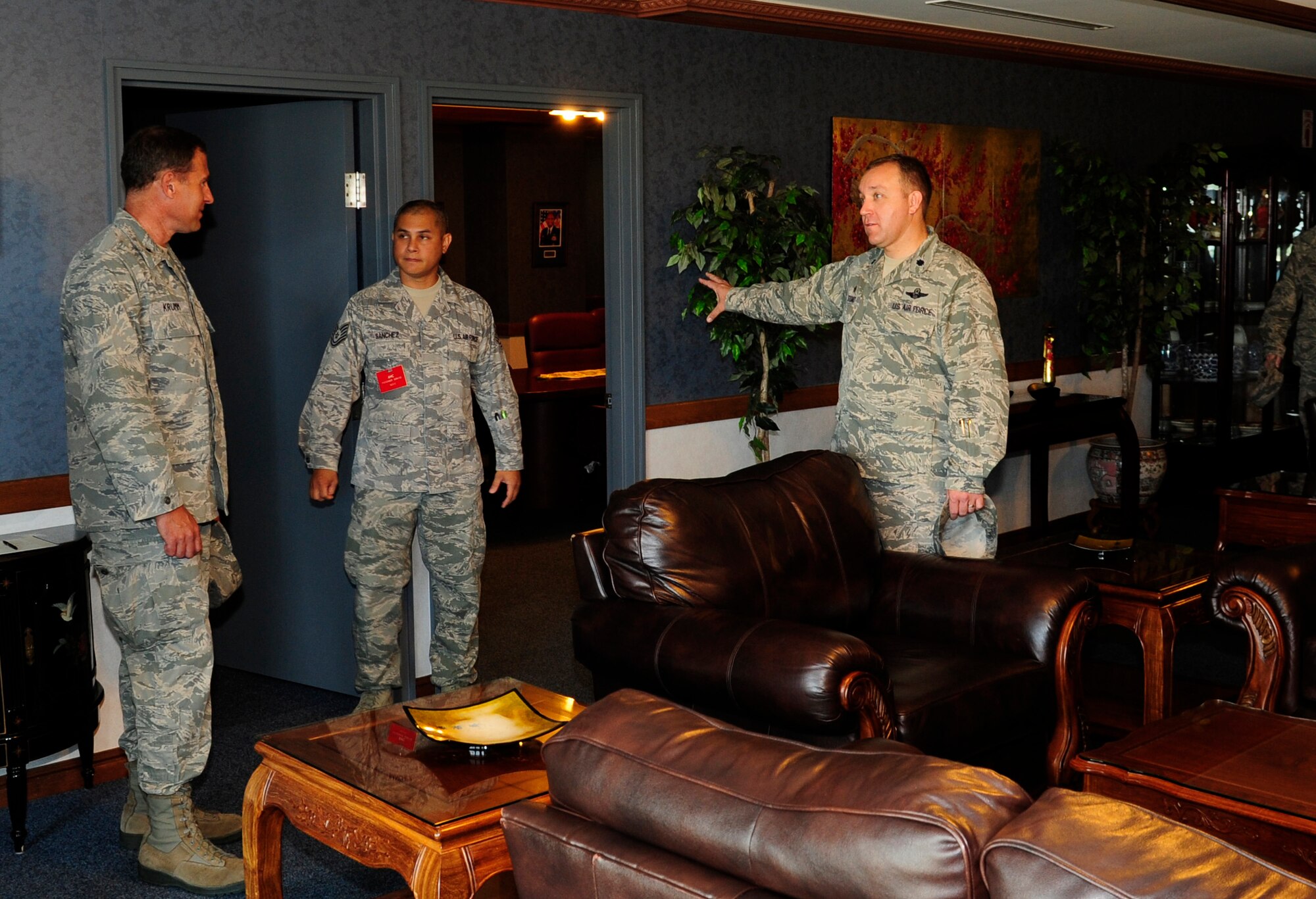 Brig. Gen. David Krumm, 5th Air Force vice commander, tours the 733rd Air Mobility Squadron passenger terminal during his visit to Kadena Air Base, Japan, Sept. 8, 2014. Airmen from the 733rd AMS briefed Krumm on the mission of the 733rd, and gave a tour of their facility. (U.S. Air Force by Airman 1st Class Keith James/Released) 