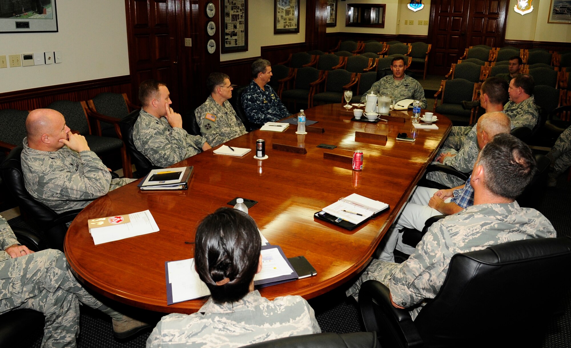 Brig. Gen. David Krumm, 5th Air Force vice commander, speaks to the commanders of the partner units at Kadena Air Base, Japan, Sept. 8, 2014. The group meeting consisted of commanders from Group 7 and the 18th Wing; they discussed each of the partner units' missions and their role at Kadena. (U.S. Air Force by Airman 1st Class Keith James/Released) 