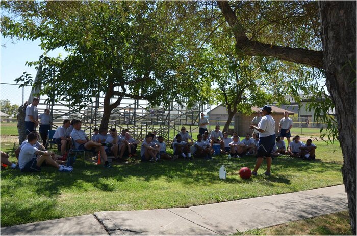 Team Beale members listen to a Comprehensive Airman Fitness day briefing at Beale Air Force Base, Calif., Sept. 8, 2014.  The event emphasized physical fitness and covered topics on nutrition, sleep and stress.  (Courtesy photo)