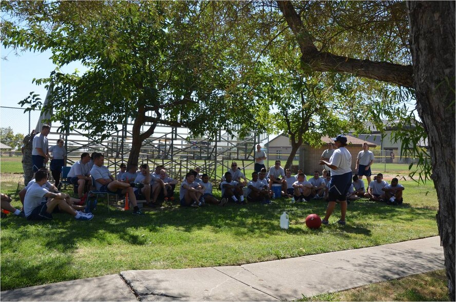 Team Beale members listen to a Comprehensive Airman Fitness day briefing at Beale Air Force Base, Calif., Sept. 8, 2014.  The event emphasized physical fitness and covered topics on nutrition, sleep and stress.  (Courtesy photo)