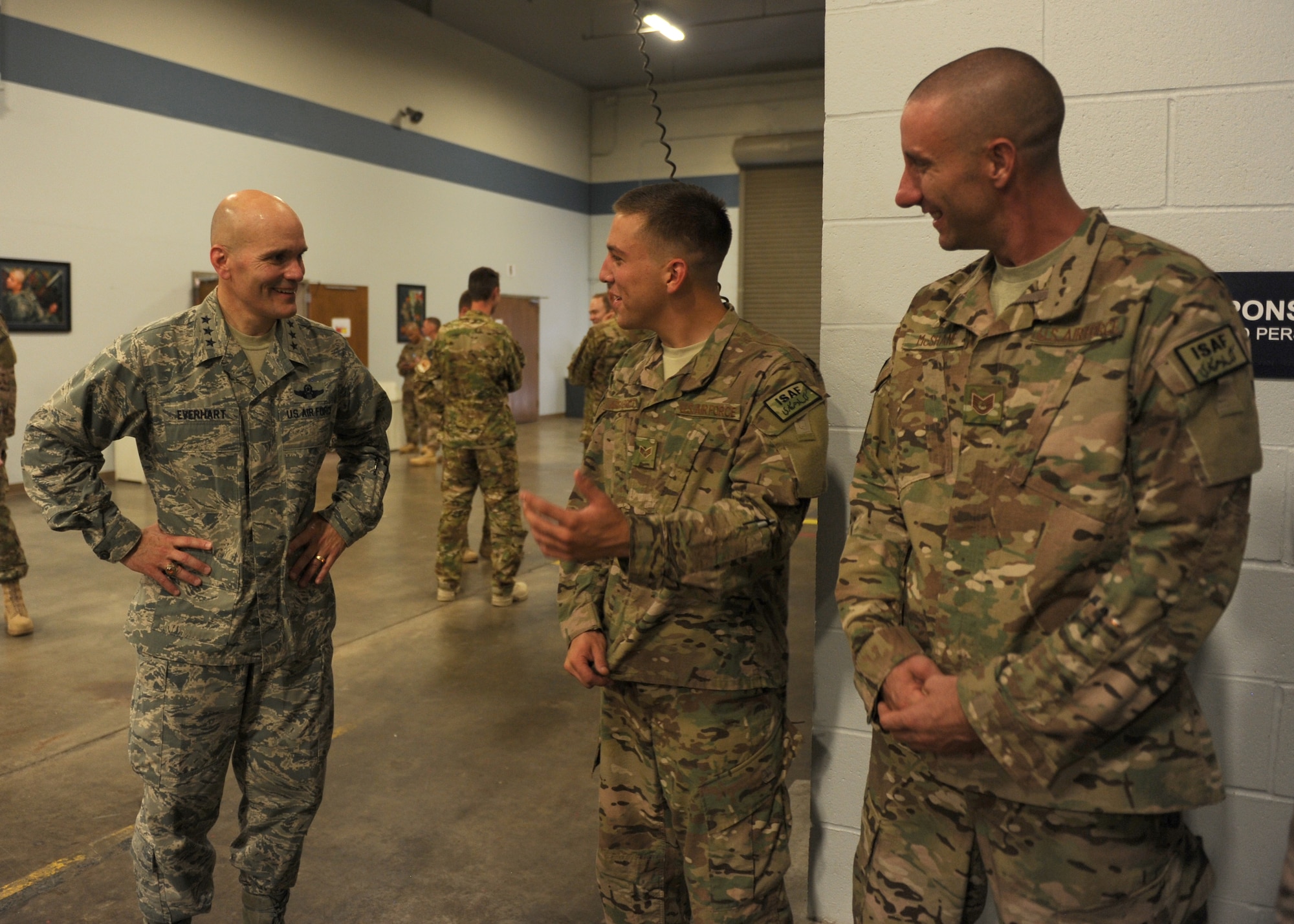 Lt. Gen. Carlton D. Everhart II, 18th Air Force commander, speaks with deployers at Team Little Rock Sept. 5, 2014, at Little Rock Air Force Base, Ark, where he thanked the deployers for their service, told them to be safe and to keep in contact with their families while they are supporting contingency operations. In a July 2014 message to Airmen, Everhart said families are a vital part of the 18th Air Force’s ability to remain strong. (U.S. Air Force photo by Airman 1st Class Scott Poe) 