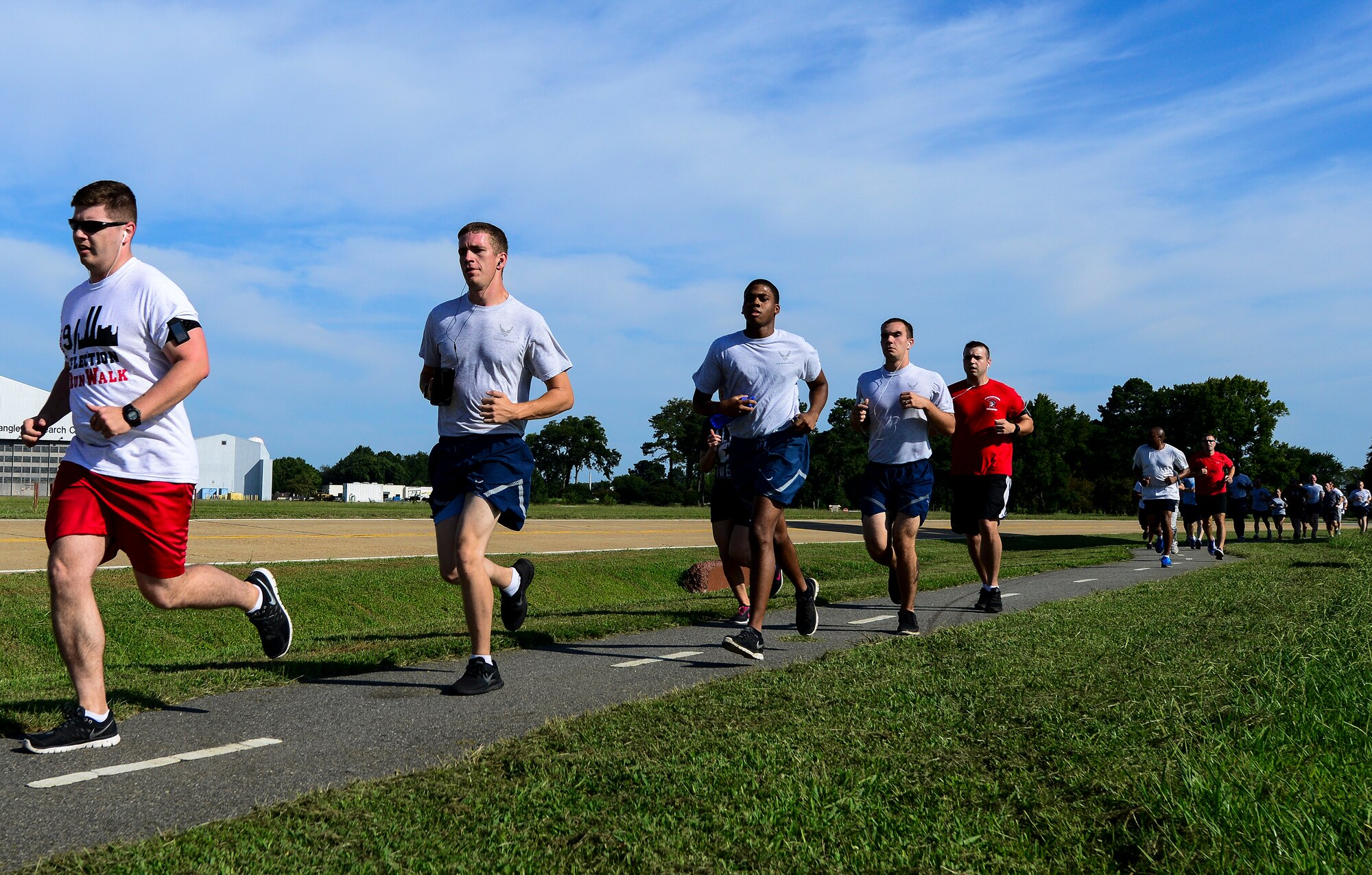 Runners participate in the 9/11 Reflection Ceremony and 5K hosted by Distributed Ground Station-1 at Langley Air Force Base, Va., Sept. 11, 2014. Almost 3,000 Americans lost their lives in the 9/11 terrorist attacks 13 years ago. (U.S. Air Force photo by Senior Airman Kayla Newman/Released) 