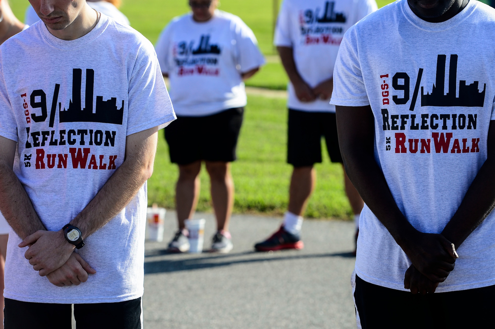 U.S. Air Force Airmen participate in the 9/11 Reflection Ceremony and 5K at Langley Air Force Base, Va., Sept. 11, 2014. This year marks the 13th year since the deadly terror attacks of Sept. 11, 2001. (U.S. Air Force photo by Senior Airman Kayla Newman/Released)