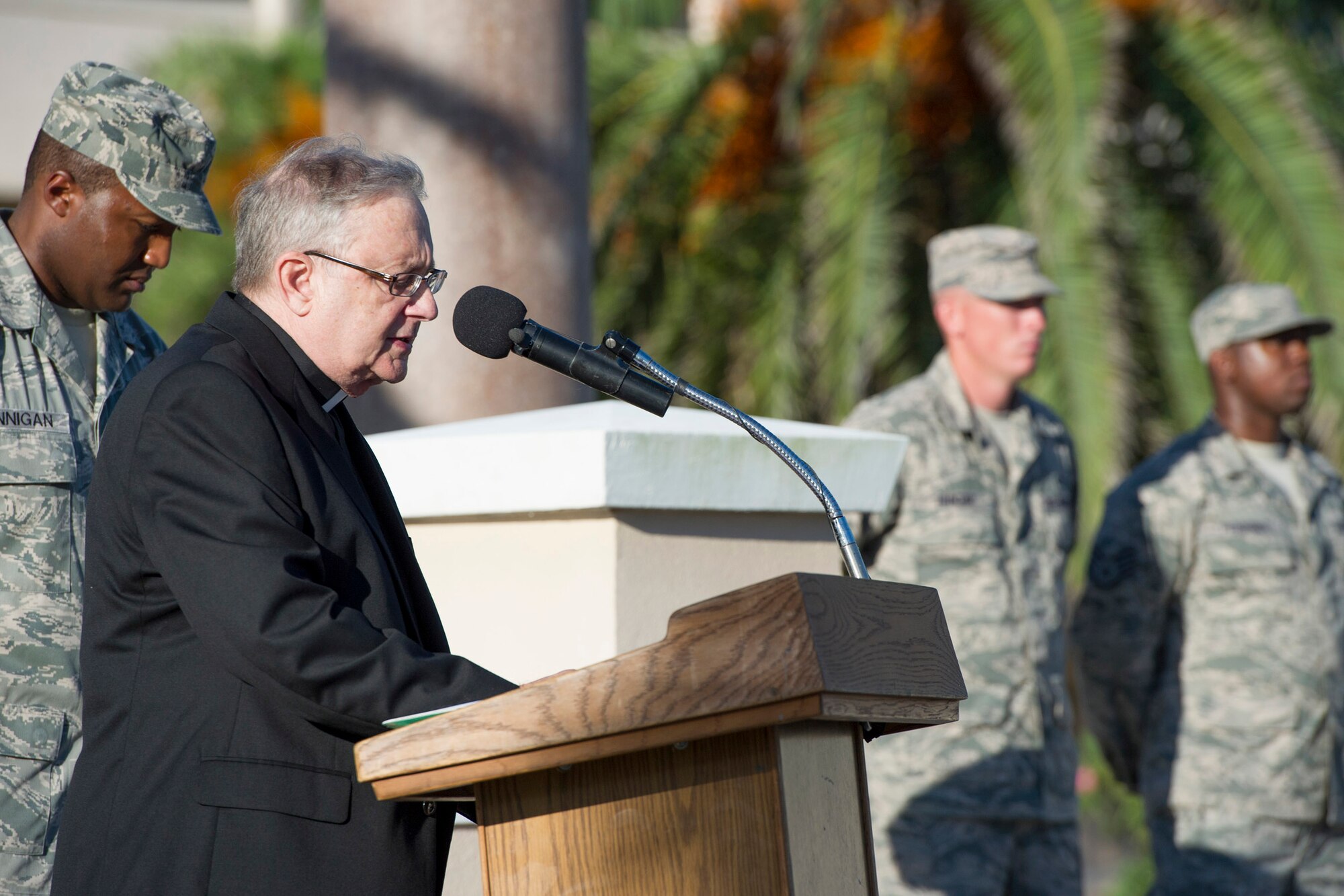 Father Michael DiRenzo, 45th Space Wing Catholic Priest, opened the memorial ceremony with a prayer. DiRenzo said we will not forget the events of that terrible morning nor will we forget how Americans responded in New York City, at the Pentagon, and in the skies over Pennsylvania -- with heroism and selflessness; with compassion and courage; and with prayer and hope. (U.S. Air Force Photo/Matthew Jurgens) (Released)