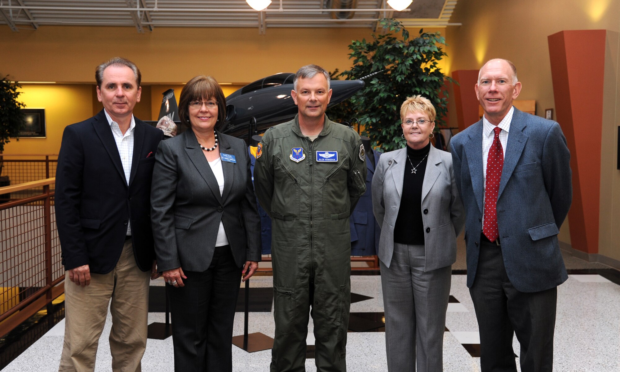 U.S. Air Force Brig. Gen. Glen VanHerck, commander of the 509th Bomb Wing, and representatives from local schools pose after signing a memorandum of understanding (MOU), Sept. 10, 2014, at Whiteman Air Force Base, Mo. The MOU details what the schools and base will continue to do to provide educational opportunities for students. From left to right are Julian Schuster, senior vice president of Webster University; Joanna Anderson, president of State Fair Community College; the general; Dorla Watkins, vice president of finance and administration at Park University; and Charles Ambrose, president of University of Central Missouri. (U.S. Air Force photo by Staff Sgt. Brigitte N. Brantley/Released)