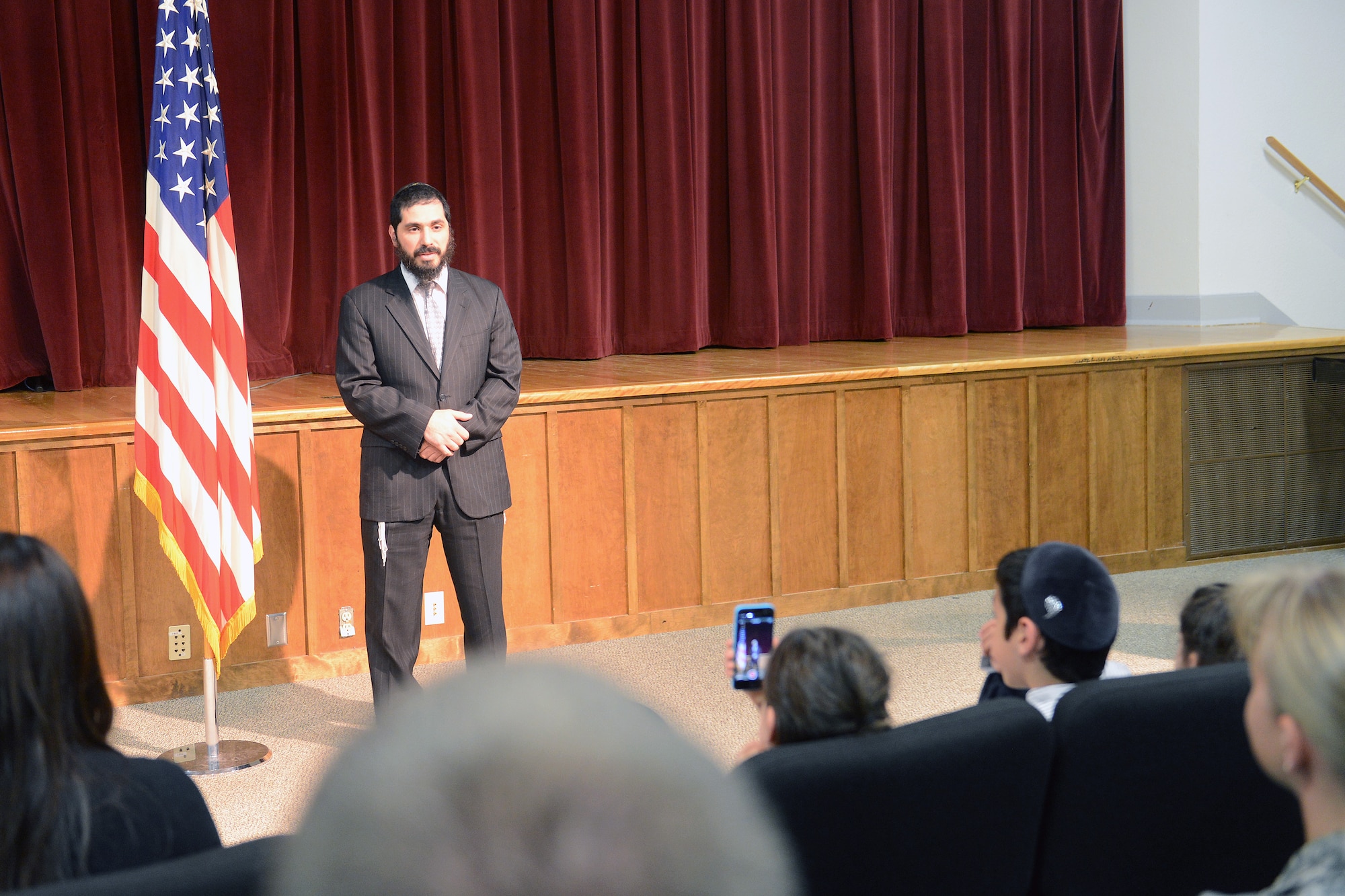 Capt. Elie Estrin, 627th Air Base Group chaplain, thanks his family and friends after swearing in Sept. 10, 2014, at Joint Base Lewis-McChord, Wash. Estrin will attend officer training later this year, followed by chaplaincy training. (U.S. Air Force photo/Airman 1st Class Jacob Jimenez) 