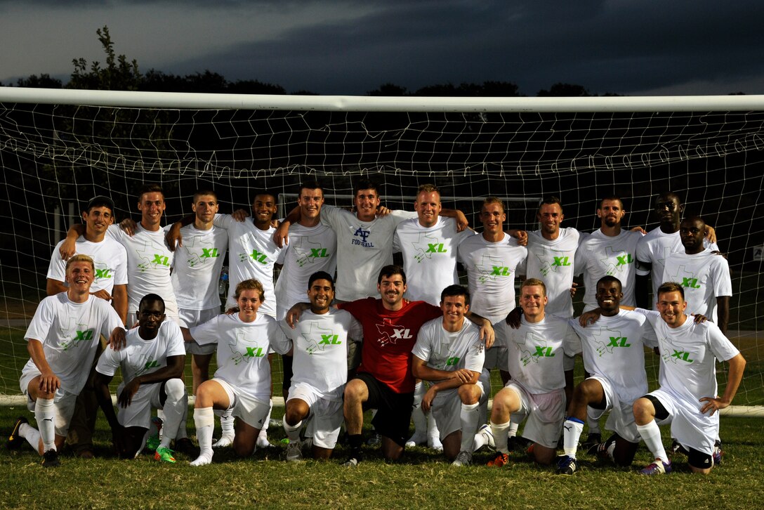 The Laughlin Football Club soccer team poses for a photo after their last match at the South Texas Area Regional Soccer Complex in San Antonio, Texas, Aug. 31, 2014. The team was comprised of officer and enlisted members from Laughlin Air Force Base and placed fifth out of 38 teams their first year at the Defender’s Cup. (U.S. Air Force photo by Airman 1st Class Jimmie D. Pike)(Released)