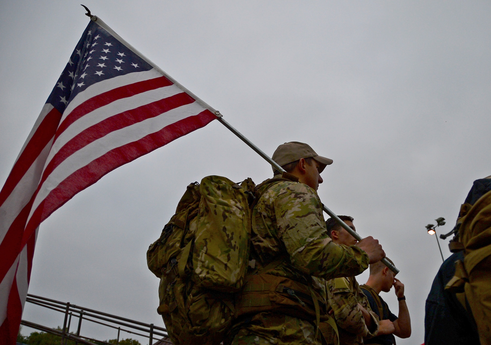 Tech. Sgt. Bruce Thomashunis, a member of the 48th Civil Engineer Explosive Ordnance Disposal flight, prepares for a 9/11 Memorial 5K Run/Walk “Moving Tribute” at Royal Air Force Lakenheath, England, Sept. 11, 2014. Military and civilian personnel showed their respect for those who lost their lives during the tragic events that occurred 13 years ago. (U.S. Air Force photo by Airman 1st Class Erin O’Shea/Released)