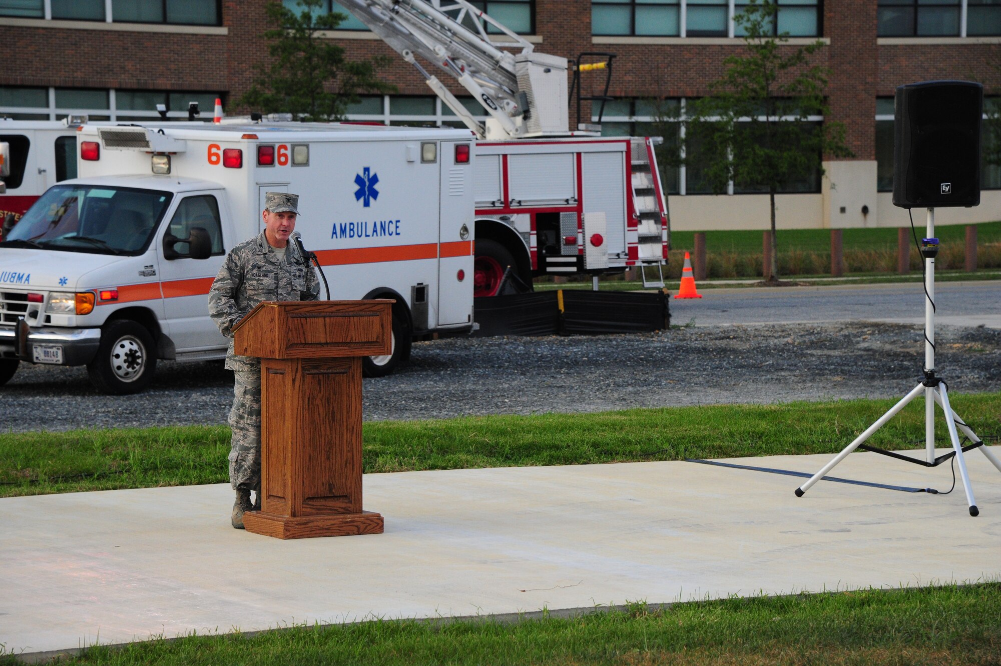 Col. Brad Hoagland, Joint Base Andrews and 11th Wing commander, speaks at morning reveille on Sept. 11, 2001 at JBA. The morning reveille paid respect to all those who lost their lives in the Sept. 11, 2001 attacks. (U.S. Air Force photo/Airman 1st Class J.D. Maidens)