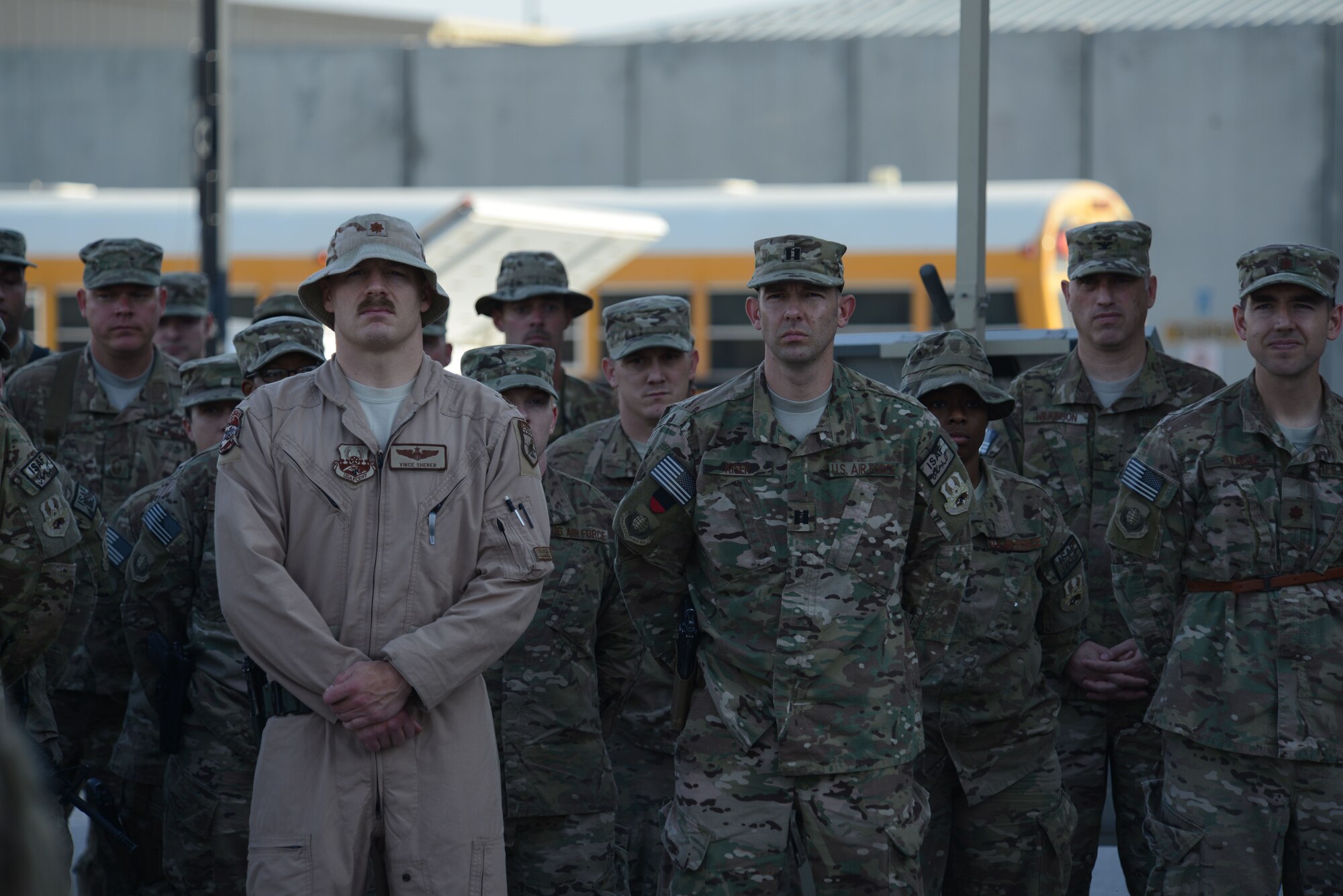 U.S. Air Force Airmen assigned to the 455th Air Expeditionary Wing stand while listening to Brig. Gen. Mark D. Kelly, 455th Air Expeditionary Wing commander, during a retreat ceremony commemorating Patriot Day at Camp Cunningham, Bagram Airfield, Afghanistan Sept. 11, 2014. Patriot Day is remembered globally as the anniversary of the terrorist attacks in the United States Sept. 11, 2001. (U.S. Air Force photo by Master Sgt. Cohen A. Young/Released)