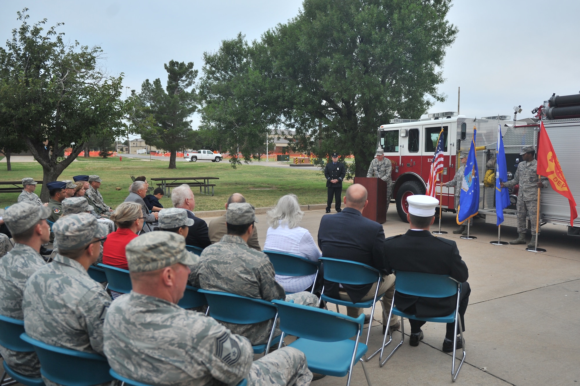 ALTUS AIR FORCE BASE, Okla. – U.S. Air Force Col. Bill Spangenthal, 97th Air Mobility Wing commander, speaks to Airmen during this year’s Patriot Day ceremony outside the base fire station Sept. 11, 2014. Spangenthal spoke of the sacrifices made by the fallen emergency responders on Sept. 11, 2001 and how their selfless service saved the lives of many. (U.S. Air Force photo by Senior Airman Dillon Davis/Released)