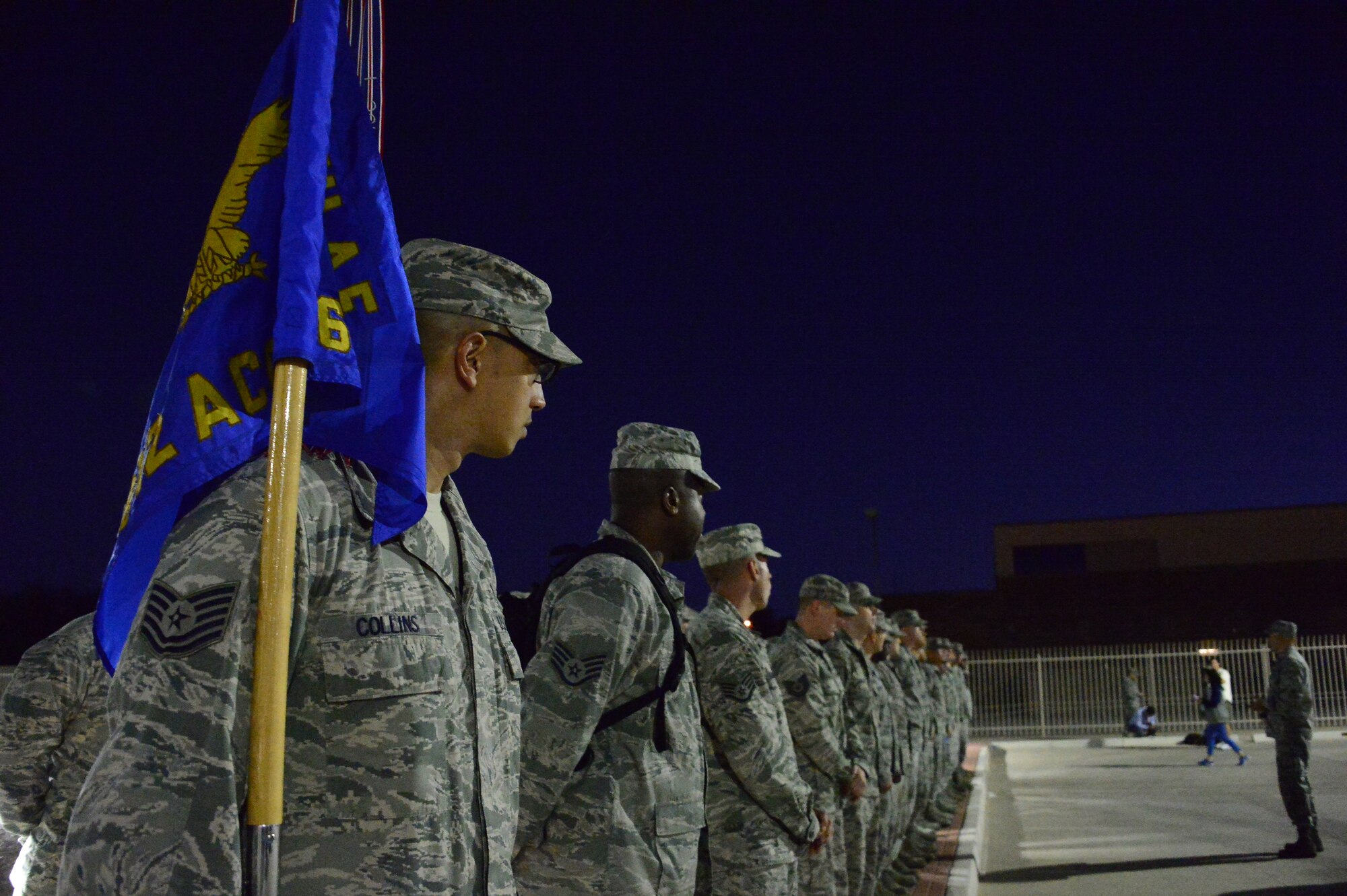 Members of the 612th Air Communication Squadron prepare to march around Davis-Monthan AFB, Ariz., in remembrance of the 9/11 victims, Sept. 11, 2014. As members marched they recalled where they were during the attacks. (USAF photo by Staff Sgt. Heather Redman/Released)
