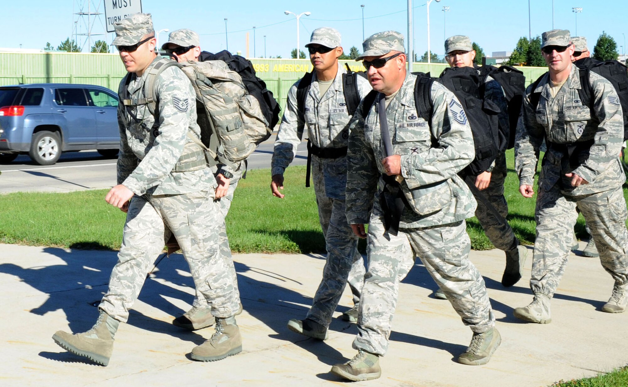 Airmen, Soldiers and civilians participate in the 28th Security Forces Squadron 9/11 Ruck March at Floyd Fitzgerald Field, Rapid City, S.D., Sept. 6, 2014. The march was first organized by the 28th SFS and 28th Civil Engineer Squadron fire protection flight; since then, the defenders have organized the event and made it into an annual tradition. (U.S. Air Force photo by Senior Airman Hailey R. Staker/Released)