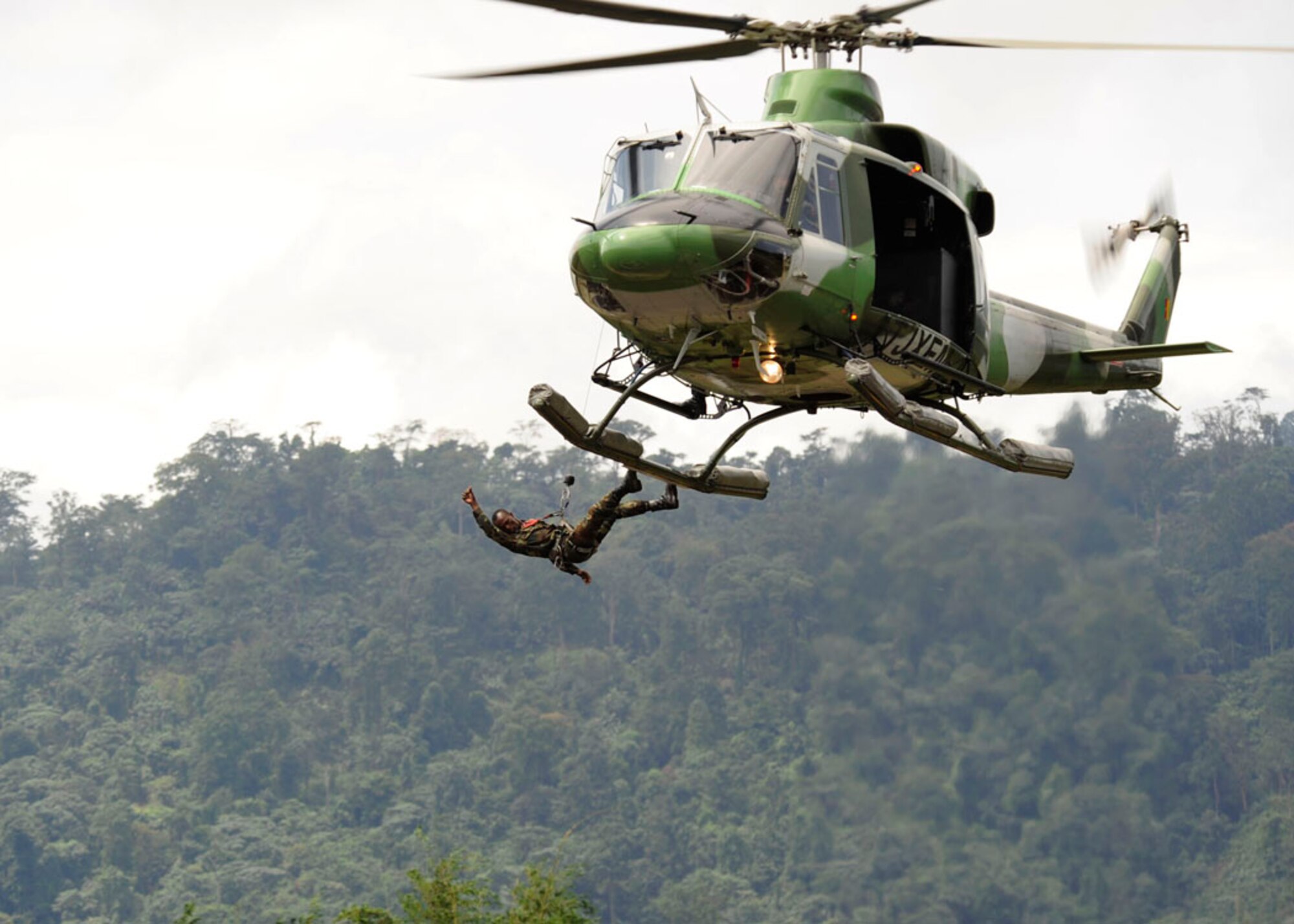 The Rapid Intervention Battalion Base troops give the African Air Chiefs a demonstration of their capabilities. The GIRAM also offers Air support to the RIB Coast Guard. Every year all the aircrew and mechanics undertake the necessary training and qualifications to improve the safety and quality of the operations which GIRAM conducts.  Sept. 10, 2014, RIB Base, Cameroon. (U.S. Air Force photo by Tech Sgt. Patrick Mitchell)