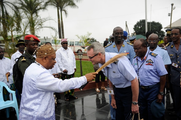 Chief Etina Monono blesses 3rd Air Force Commander Lt. General Darryl Roberson before the Great Soppo Chiefdom ceremony. The Great Soppo is a second class Chiefdom with the Duea subdivision. Originally there were four groupings with the name Soppo. Mokongo, Soppo Wonganga, Soppo Wovila and Soppo Woteke. Since Soppo Mokongo was the largest of them it became a second class chiefdom while the others became third class chiefdoms. Sept. 10, 2014, in Buea, Camerron. (U.S. Air Force photo by Tech Sgt. Patrick Mitchell)