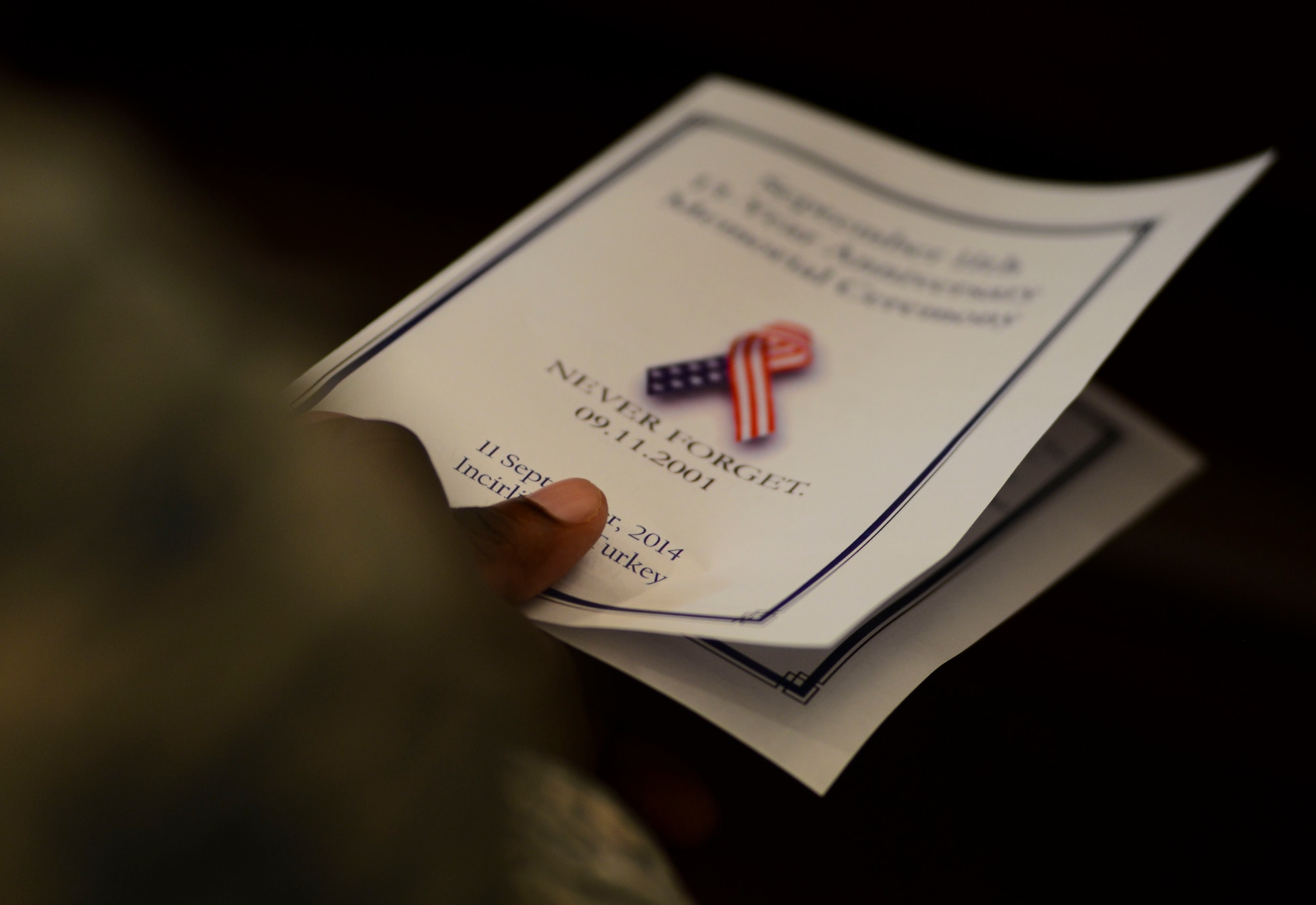 Service members and others attended the 9/11 memorial service at the base chapel Sept. 11, 2014, Incirlik Air Base, Turkey. This year marks the 13th anniversary of the 9/11 tragedy. (U.S. Air Force photo by Staff Sgt. Eboni Reams/Released)