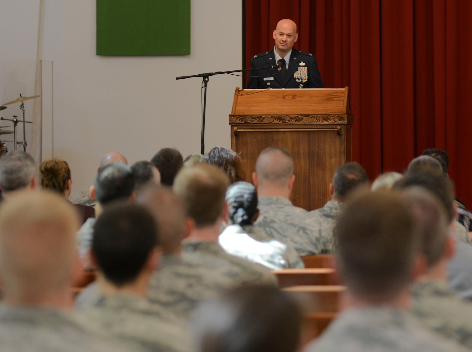 Col. Mark Anarumo, 39th Air Base Wing vice commander, speaks during the 9/11 memorial ceremony at the base chapel Sept. 11, 2014, Incirlik Air Base, Turkey. Nearly 100 people came together for the remembrance service. (U.S. Air Force photo by Staff Sgt. Eboni Reams/Released)