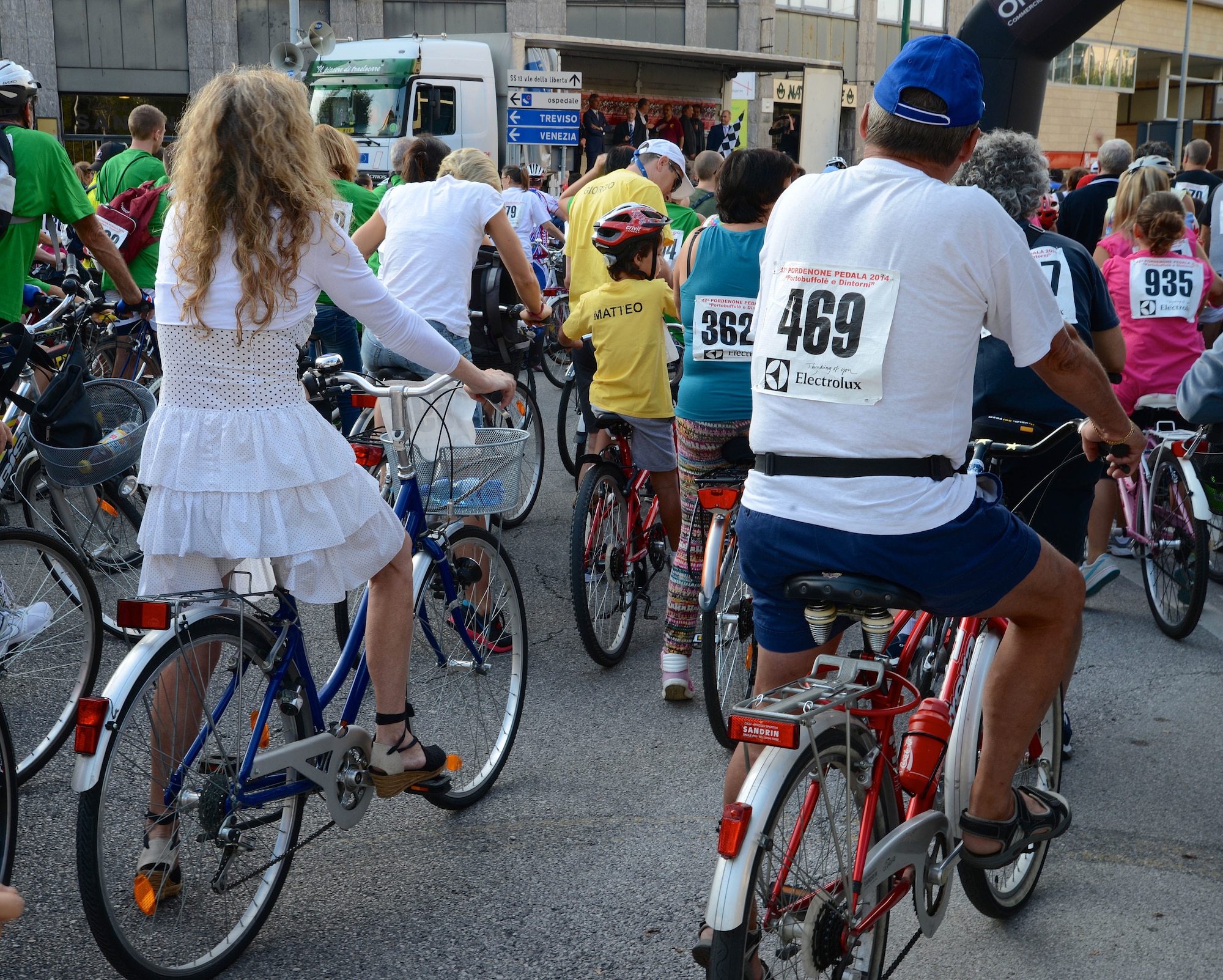 Participants gather at the start of the 42nd Annual Pordenone Pedala bike ride, Sept. 7, 2014, in Pordenone, Italy. The event that started in Pordenone had riders cycle approximately 28 miles through 12 local Italian towns. (U.S. Air Force photo/Capt. Lacie Collins)