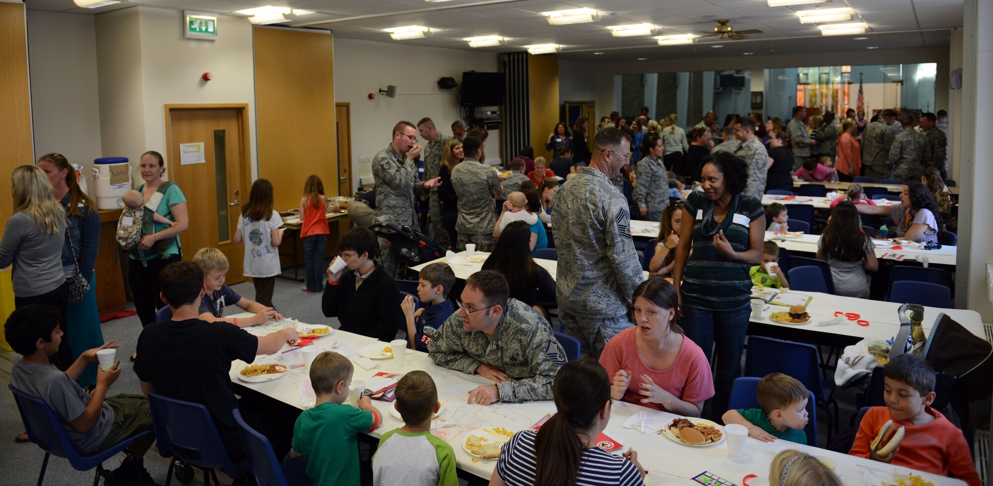 The 100th Security Forces Squadron hosted a Hearts Apart event for families of deployed Airmen Sept. 10, 2014, at the chapel on RAF Mildenhall, England. A Hearts Apart dinner is a way for spouses and family members of deployed Airmen to gather together and network. (U.S. Air Force photo/Airman 1st Class Preston Webb/Released)