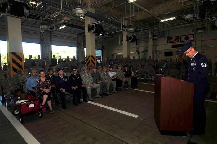U.S. Air Force Tech. Sgt Daniel Newland, 35th Civil Engieer Squadron battalion chief, reads the firefighter prayer during the 9/11 ceremony at Misawa Air Base, Japan, Sept. 11, 2014.  During the ceremony three prayers were read for the firefighters, police officers and emergency medical services. (U.S. Air Force photo/Tech. Sgt. April Quintanilla)