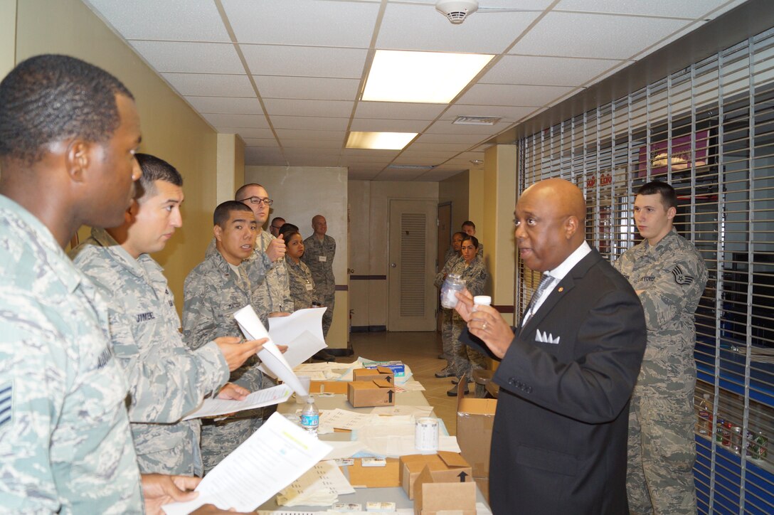 Andre Johnson 36th Medical Group Drug Demand Reduction program manager, discusses urinalysis procedures with Andersen Airmen Sept. 2, 2014 on Andersen Air Force Base, Guam. Andersen has increased testing and unit sweeps to meet the Department of Defense’s heightened testing requirements. (Courtesy photo) 