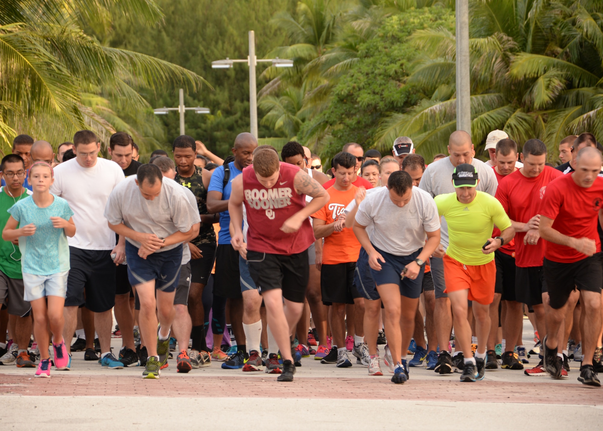 Members of Team Andersen take off during the Remembering our Heroes 5k at Tarague Beach Sep. 11, 2014 on Andersen Air Force Base, Guam. Approximately 200 runners participated in the 5k run and included members from all branches of service. (U.S. Air Force photo by Senior Airman Cierra Presentado/Released)