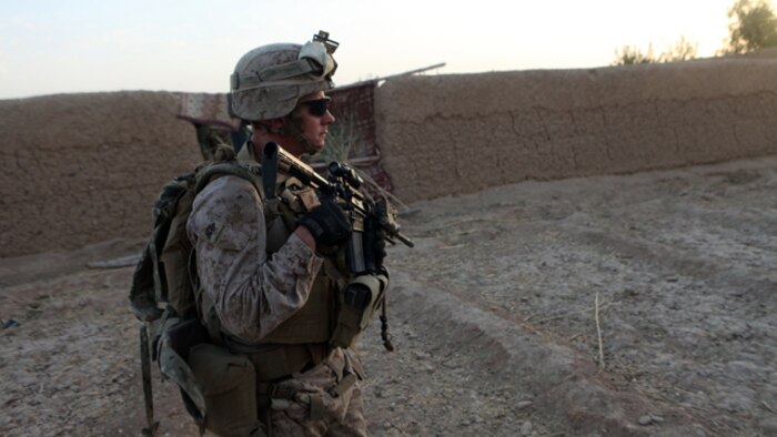 First Sgt. Brian Moody, first sergeant, Bravo Company, 1st Battalion, 2nd Marine Regiment, patrols through southern Helmand province, Afghanistan, Sept. 3, 2014. The operation was designed to deter enemy insurgents from operating in the southern area of Helmand province. (U.S. Marine Corps photo by Cpl. Cody Haas/ Released)