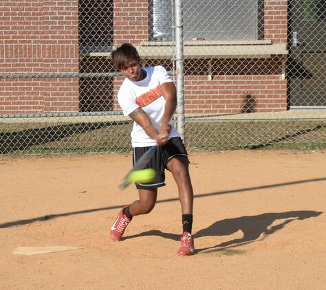 Sgt. Candice Clark practices her batting skills at one of Marine Corps Logistics Base Albany’s softball fields, recently. The practice helped hone her skills for the All-Marine Women’s Softball Team tryouts at Fort Sill, Oklahoma, from Sept. 3-14. 