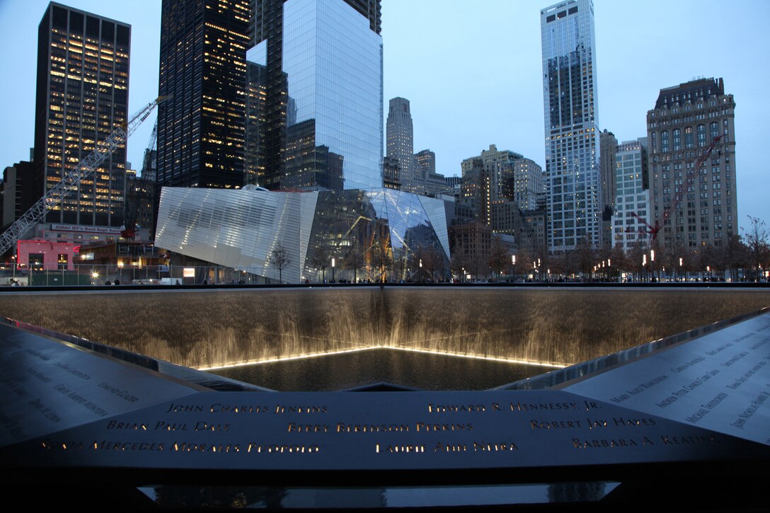 This is the pavilion view of the North Pool located at the former World Trade Center site in New York. The names of the victims are inscribed on 76 bronze plates.