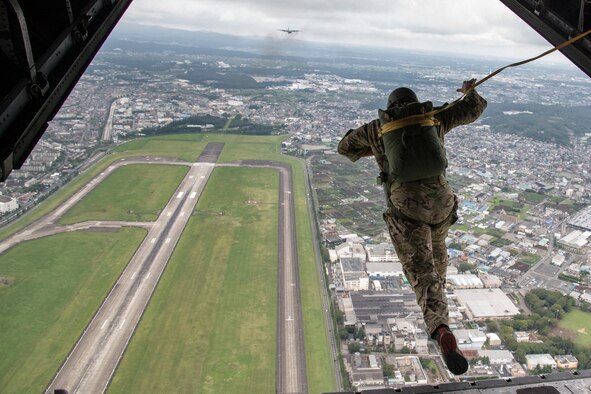 Soldiers conduct a jump demonstration from a C-130 Hercules Sept. 7, 2014, during the Japanese-American Friendship Festival at Yokota Air Base, Japan. Yokota welcomed approximately 148,000 visitors during the two-day festival. The Soldiers are assigned to the 1st Battalion, 1st Special Forces Group (Airborne). (U.S. Air Force photo/Senior Airman Michael Washburn)