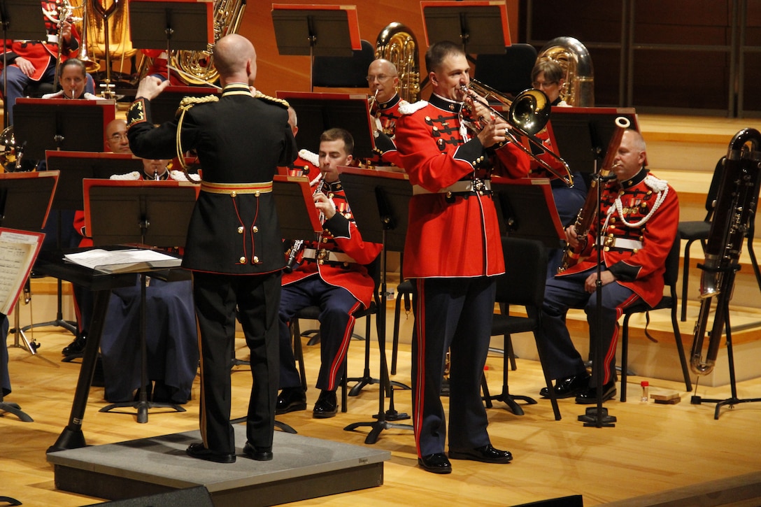 Lieutenant Col. Jason K. Fettig, the United States Marine Band director, conducts the Marine Band while Gunnery Sgt. Samuel Barlow, a Marine Band trombonist, performs the solo portion of composer Arthur Pryor's "Fantastic Polka" in Helzberg Hall at the Kauffman Center for the Performing Arts in Kansas City, Mo., as part of its 2014 National Tour. The Marine Band, also known as the "President's Own", is the oldest military band in the nation and the oldest professional musical organization in the country. The Marine Band performs at state funerals, presidential inaugurations, various sporting events, and other significant national events.