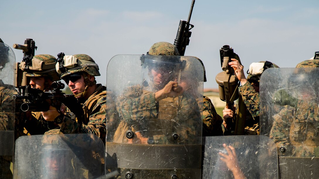 Marines from Golf Co., 2nd Battalion, 2nd Marines make an anti-riot formation on Black Sea Rotational Force 14,Sept. 9, during a non-lethal weapons course on Mihail Kogalniceanu Air Base, Romania. Sustainment in these skills will improve military-to-military engagements with Eastern European partner nations during the current iteration’s rotation. 