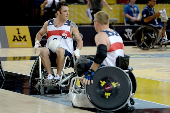 Air Force Staff Sgt. Christopher D'Angelo warms up before a wheelchair rugby match against the Australian wheelchair rugby team Sept. 12, 2014, at the 2014 Invictus Games in London. Invictus Games is an international competition that brings together wounded, injured and ill service members in the spirit of friendly athletic competition. American Soldiers, Sailors, Airmen and Marines are representing the U.S. in the competition which is taking place from Sept. 10-14. (U.S. Navy photo/Mass Communication Specialist 2nd Class Joshua D. Sheppard)
