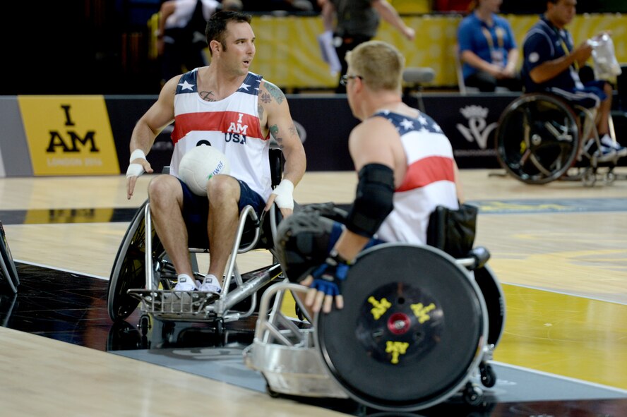 Air Force Staff Sgt. Christopher D'Angelo warms up before a wheelchair rugby match against the Australian wheelchair rugby team Sept. 12, 2014, at the 2014 Invictus Games in London. Invictus Games is an international competition that brings together wounded, injured and ill service members in the spirit of friendly athletic competition. American Soldiers, Sailors, Airmen and Marines are representing the U.S. in the competition which is taking place from Sept. 10-14. (U.S. Navy photo/Mass Communication Specialist 2nd Class Joshua D. Sheppard)