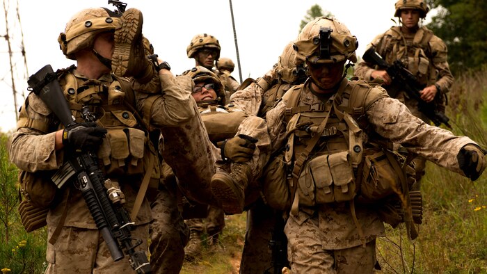 Students with Charlie Company at The Basic School at Marine Corps Base Quantico, simulated the evacuation of a Marine killed in action Sept. 9 at the training grounds of Quantico. The Marines are on their seven-day War Field Exercise from Sept. 5-12. 