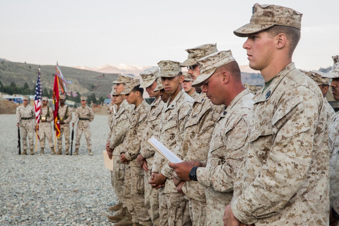 U.S. Marine Sgt. Christopher Cochems reads the heroic actions of civilians aboard United Airlines Flight 93 during a 9/11 memorial while aboard Marine Corps Mountain Warfare Training Center in Bridgeport, Calif., Sept. 11, 2014. Cochems, 28, is from Bemidji, Minn., and is with Combat Logistics Battalion 15. Marines with CLB-15 will become the 15th Marine Expeditionary Unit’s combat logistics element in October. (U.S. Marine Corps photo by Sgt. Emmanuel Ramos/Released)