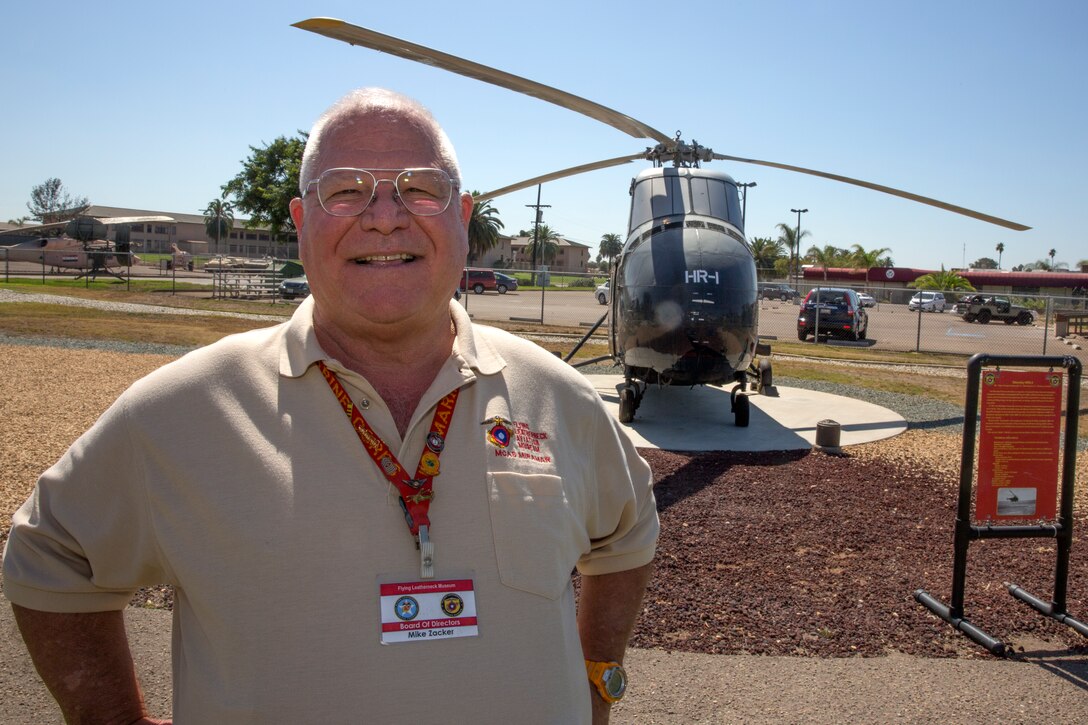 Retired Sgt. Maj. Mike Zacker, Secretary of the Board of Directors and docent at the Flying Leatherneck Aviation Museum and Historical Foundation, poses for a photo in front of an HRS-1 at the museum aboard Marine Corps Air Station Miramar Calif., Sept. 10. Zacker spent 18 of his 30 year career working on the HRS-1 and similar helicopters.