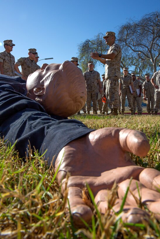 A dummy called Fred lays on the grass during a lesson given by Gunnery Sgt. Antonio Lopez, the outgoing course chief with 343rd Training Squadron out of Lackland Air Force Base, Texas, during the Traffic Collision Investigation Course aboard Marine Corps Air Station Miramar, Calif., Sept. 11. The course is designed to teach students proper procedures to investigate accidents.