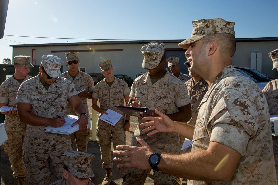 Gunnery Sgt. Antonio Lopez, the outgoing course chief with 343rd Training Squadron out of Lackland Air Force Base, Texas, explains a portion of the class’ practical application lesson during the Traffic Collision Investigation Course aboard Marine Corps Air Station Miramar, Calif., Sept. 11. This is the third successive course and the final one to be held in the Marine Corps. The course began in Camp Foster, Okinawa, Japan, then moved to Marine Corps Base Camp Lejeune, N.C., before making its final stop at the air station.