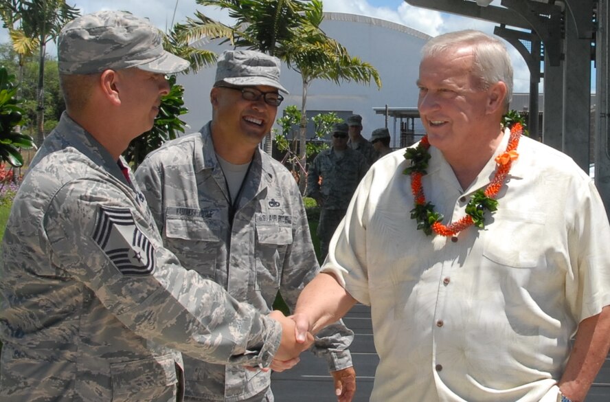 Chiefs from the Hawaii Air National Guard and active duty Air Force greet Retired Chief Master Sgt. of the Air Force James C. Binnicker at Joint Base Pearl Harbor Hickam, Sep. 12, 2014. Binnicker toured an F22 TFI unit and facility as part of a tour of Joint Base Pearl Harbor Hickam. (U.S. Air Force photo by Senior Airman Orlando Corpuz)