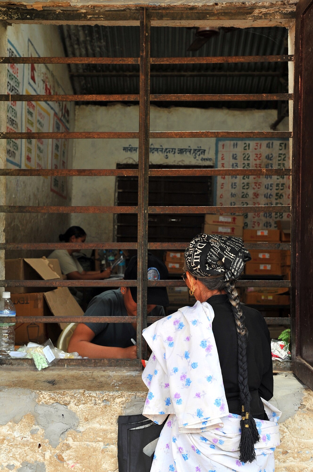 A patient receives medication from the Operation Pacific Angel-Nepal pharmacy at a health services outreach site in Shaktikhor, Nepal, Sept. 11, 2014. PACANGEL helps cultivate common bonds and foster goodwill between the U.S., Nepal and regional nations by conducting multilateral humanitarian assistance and civil military operations. (U.S. Air Force photo by Staff Sgt. Melissa B. White/Released)