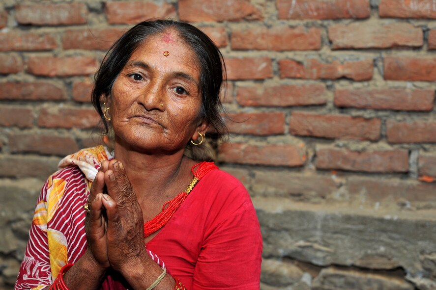 A patient waits to be seen by Operation Pacific Angel-Nepal physical therapists at a health services outreach site in Shaktikhor, Nepal, Sept. 12, 2014. PACANGEL helps cultivate common bonds and foster goodwill between the U.S., Nepal and regional nations by conducting multilateral humanitarian assistance and civil military operations. (U.S. Air Force photo by Staff Sgt. Melissa B. White/Released)