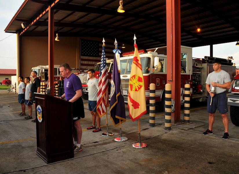 U.S. Army Col. Kirk Dorr recited part of the narrative of the four flights and their target as a bell was rung at the beginning of each story in memoriam of the firefighters, police, emergency personnel, civilians who were killed in the attacks and the military personnel who have lost their lives in the wars since. Joint Task Force-Bravo and Honduran military members paused Thursday to remember the more than 3,000 people who lost their lives during the 9/11 attacks against the World Trade Center, the Pentagon, and the aircraft crash in Shanksville, Pennsylvania with a remembrance service and 3.43 mile memorial run at Soto Cano Air Base, Honduras. (Photo by Ana Fonseca)