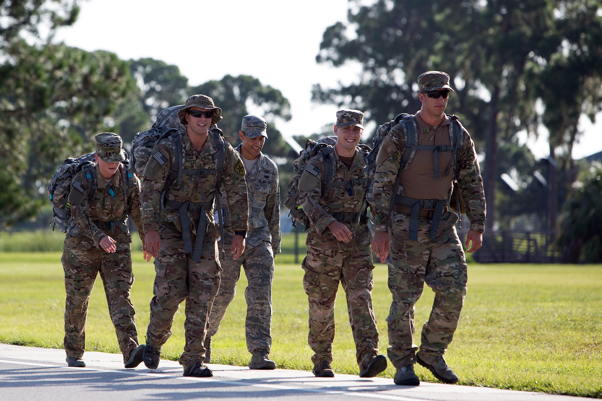 Senior Airman Jeffrey Gebhardt (right), 446th Force Support Squadron client systems technician, out of Joint Base Lewis-McChord, Washington, and his teammates ruck it at Warrior Spirit, Aug. 19, 2014 at MacDill Air Force Base, Florida. Gebhardt has been assigned to the Joint Communications Support Element at MacDill since November 2013, and is on long-term orders to continue his needed support. Warrior Spirit is a weeklong team-based exercise built to validate technical and tactical skills while creating unit cohesion. (Courtesy photo/JCSE)