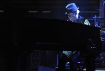 Neal Doughty, the REO Speedwagon keyboardist, plays the piano during a performance at the Spokane Interstate Fair in Spokane, Washington, Sept. 11, 2014. REO Speedwagon thanked America’s veterans and families, both past and present, for their service and sacrifice in the name of freedom. Total force Airmen from around the globe took time to commemorate the 13th anniversary of Sept. 11, 2001, with everything from commemorative runs, to tributes and moments of silence. (U.S. Air Force photo by Staff Sgt. Samantha Krolikowski/Released)